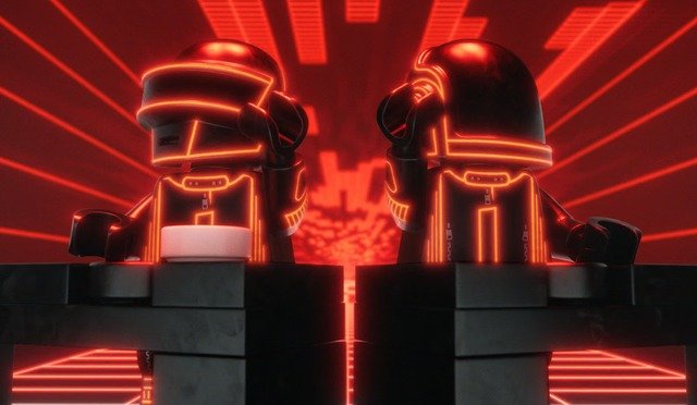 Two Daft Punk robot minifigures in LEGO brick style facing each other, outlined in glowing red neon, behind a brick-built console