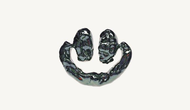 Artwork for Fakear's album "A Nice Place to Be", a glossy green-blue sculpted smiley face on a white background